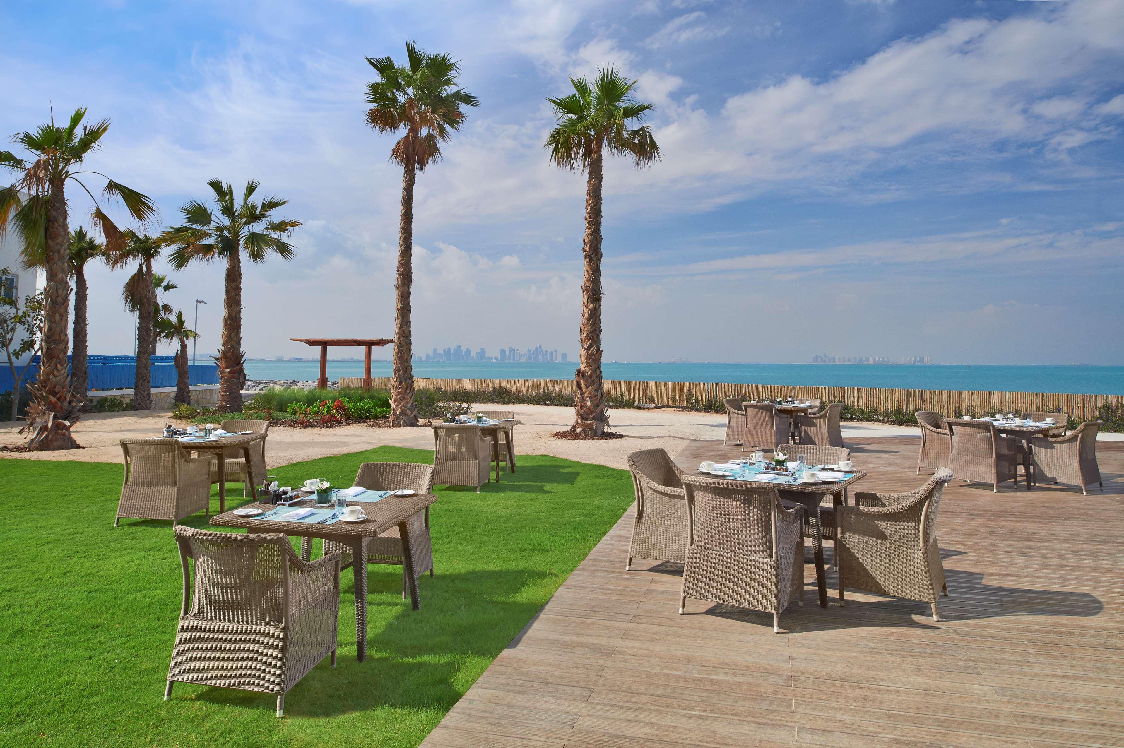 Banana Island Resort Doha By Anantara Exterior photo The Beach at Jumeirah at Etihad Towers